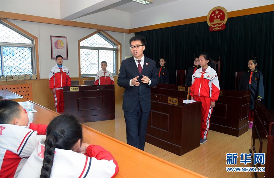 http:\/\/www.people.com.cn\/rss\/politics.xml