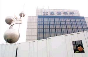 钱程对北京音乐厅的承包曾被指责为“暗箱操作”。图为施工中的北京音乐厅。 资料图片