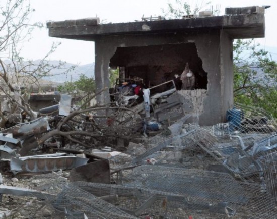 Rubble: Syria has branded the attacks a 'declaration of war' and pledged retaliation against Israel