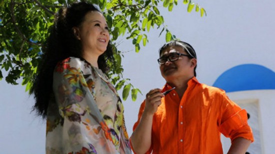 刘欢与妻卢璐希腊办银婚典礼 25年后首披婚纱/图