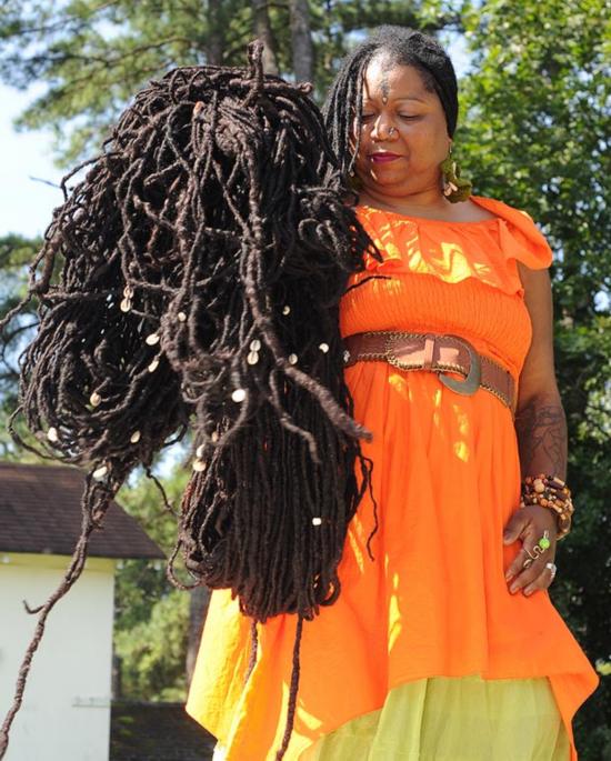 Asha Mandela's hair weighs three stone