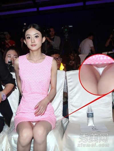 坐姿不雅秀裙下春光