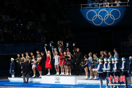 索契冬奥会:普京<em>打鼓</em>庆祝俄罗斯摘花滑团体金