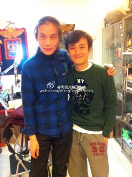 文章纹身照片曝光 被疑满背图案为两爱女