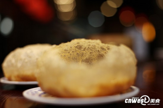 陕西美食是怎样练成的:泡泡油糕见风消