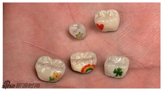 牙齿<em>纹身</em>引新潮 重口味身体艺术--时尚--人民网