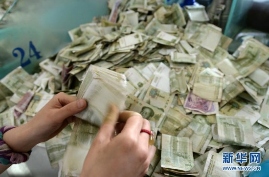 承德公交点钞"娘子军":每天点1万张纸钞 12斤硬币【3】--河北频道--人民网