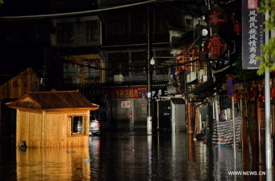 More than 120,000 locals and tourists have been evacuated since Monday night as record downpours hit the county, a tourist destination renowned for its ancient town.