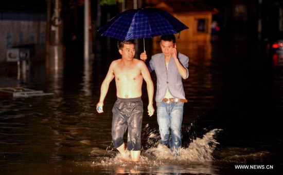 More than 120,000 locals and tourists have been evacuated since Monday night as record downpours hit the county, a tourist destination renowned for its ancient town.