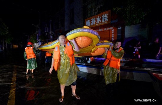 More than 120,000 locals and tourists have been evacuated since Monday night as record downpours hit the county, a tourist destination renowned for its ancient town.