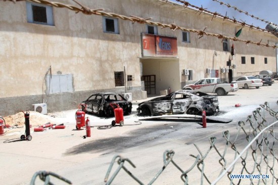 The photo taken on July 16, 2014 shows some destroyed cars in Tripoli International Airport, in Libya. 