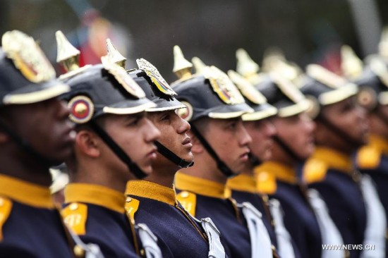 Cadets of the Military Forces take part in the annual military parade for the celebration of Independence Day, in Bogota city, capital of Colombia, on July 20, 2014. 
