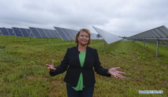 Apple's vice President of Environmental Initiatives and former administrator of the U.S. Environmental Protection Agency Lisa P. Jackson introduces the solar panels at Apple Data Center in Maiden, North Carolina, the United States, on July 22, 2014. 
