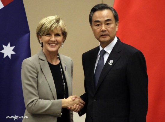 Chinese Foreign Minister Wang Yi (R) meets with Australia's Minister for Foreign Affairs Julie Bishop on the sidelines of the series of ASEAN Foreign Ministers' Meetings (AMM) on East Asia cooperation in Myanmar's capital of Nay Pyi Taw on Aug. 9, 2014. (Xinhua/U Aung) 