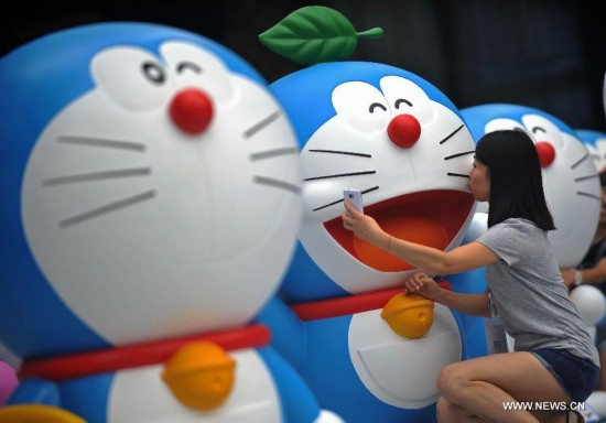 The exhibition kicked off here on Saturday. A hundred and two life-size Doraemon figures, each of which bearing a distinct secret gadget, were displayed during the show. Doraemon, a fictional 22nd-century robotic cat, has been a popular anime character since its introduction by Japanese cartoonist Fujiko Fujio in 1969.