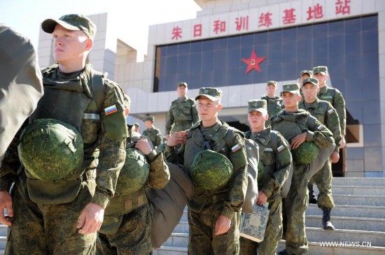 The first Russian army echelon on Saturday arrived at the Zhurihe training base, where 'Peace Mission-2014,' a drill under the Shanghai Cooperation Organization (SCO) framework, will run from Aug. 24-29. The drill, which will involve over 7,000 personnel from China, Russia, Kazakhstan, Kyrgyzstan and Tajikistan, is expected to hone multilateral decision-making, sharpen joint anti-terror efforts and boost intelligence sharing to ensure regional peace and stability.