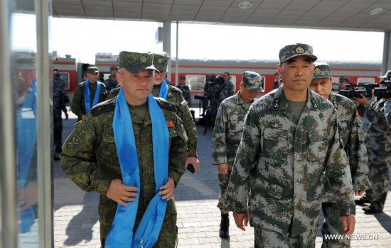 The first Russian army echelon on Saturday arrived at the Zhurihe training base, where 'Peace Mission-2014,' a drill under the Shanghai Cooperation Organization (SCO) framework, will run from Aug. 24-29. The drill, which will involve over 7,000 personnel from China, Russia, Kazakhstan, Kyrgyzstan and Tajikistan, is expected to hone multilateral decision-making, sharpen joint anti-terror efforts and boost intelligence sharing to ensure regional peace and stability.