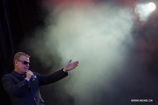 Chas Smash, singer of British band Madness performs during the Sziget (Hungarian for 'Island') Festival on the Obuda Island in Budapest, Hungary on August 16, 2014. The 22nd edition of the Sziget Festival lasts from August 11 to August 17. 