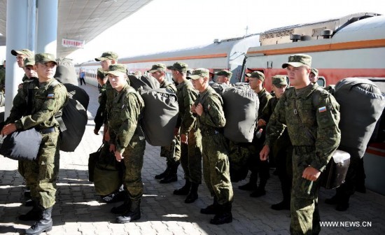 The first Russian army echelon on Saturday arrived at the Zhurihe training base, where 'Peace Mission-2014,' a drill under the Shanghai Cooperation Organization (SCO) framework, will run from Aug. 24-29. The drill, which will involve over 7,000 personnel from China, Russia, Kazakhstan, Kyrgyzstan and Tajikistan, is expected to hone multilateral decision-making, sharpen joint anti-terror efforts and boost intelligence sharing to ensure regional peace and stability.