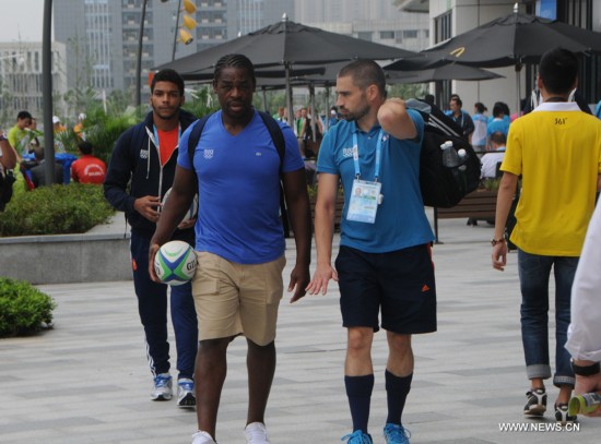 Photos of athletes and coashes taken on August 19, 2014 show how fashionable they are in Youth Olympic Village of Nanjing 2014 Youth Olympic Games which kicked off on August 16, 2014 in Nanjing, east China's Jiangsu Province.