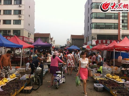 银河商贸城vs南王家村市场 百米之隔一冷一热