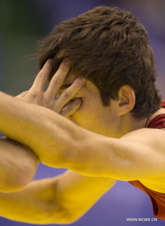 Elmedin Sejfulau of Macedonia competes in the Men's Freestyle 54kg of wrestling event during Nanjing 2014 Youth Olympic Games in Nanjing, capital of east China's Jiangsu Province, on Aug. 27, 2014.