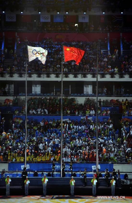 The national flag of People’s Republic of China is raised during the closing ceremony of Nanjing 2014 Youth Olympic Games in Nanjing, capital of east China’s Jiangsu Province, Aug. 28, 2014.