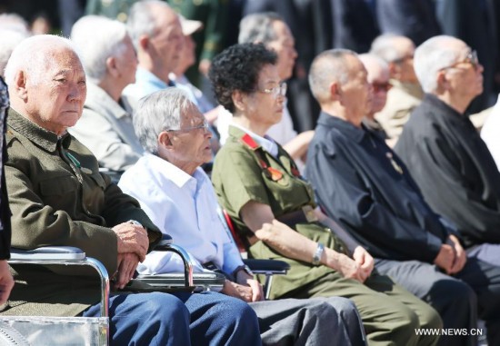 Veterans attend a ceremony to mark the 69th anniversary of the Victory Day in the Anti-Japanese War at the Museum of the War of the Chinese People's Resistance Against Japanese Aggression in Beijing, capital of China, Sept. 3, 2014.