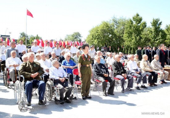 Veterans attend a ceremony to mark the 69th anniversary of the Victory Day in the Anti-Japanese War at the Museum of the War of the Chinese People's Resistance Against Japanese Aggression in Beijing, capital of China, Sept. 3, 2014.