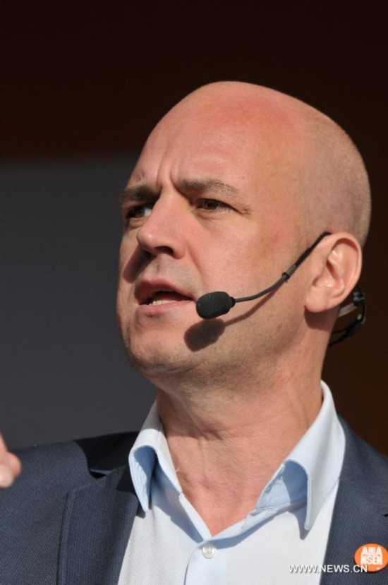 Swedish Prime Minister Fredrik Reinfeldt delivers a speech during an election campaign in Stockholm, Sweden, Sept. 13, 2014.