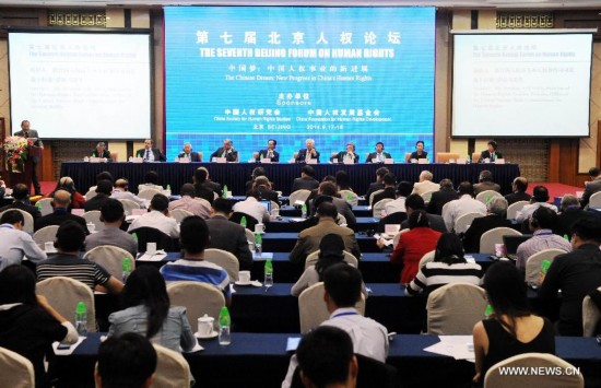 Delegates attend the Seventh Beijing Forum on Human Rights in Beijing, capital of China, Sept. 17, 2014. 