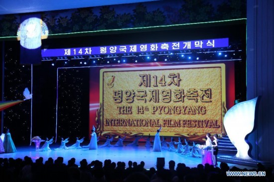 Dancers perform during the opening ceremony of the Pyongyang International Film Festival in Pyongyang, capital of the Democratic People's Republic of Korea (DPRK), on Sept. 17, 2014. The Pyongyang International Film Festival, which will feature more than 100 films from over 40 countries and international organizations, opened Wednesday at the Ponghwa Art Theater. (Xinhua/Lu Rui)