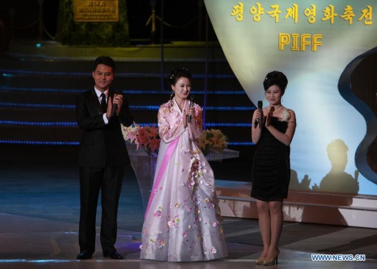 Three comperes host the opening ceremony of the Pyongyang International Film Festival in Pyongyang, capital of the Democratic People's Republic of Korea (DPRK), on Sept. 17, 2014. The Pyongyang International Film Festival, which will feature more than 100 films from over 40 countries and international organizations, opened Wednesday at the Ponghwa Art Theater. (Xinhua/Guo Yina)