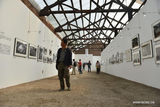 The exhibition runs here from Sept. 19 to 25, showing some 20,000 photos by over 2,000 photographers around the globe.