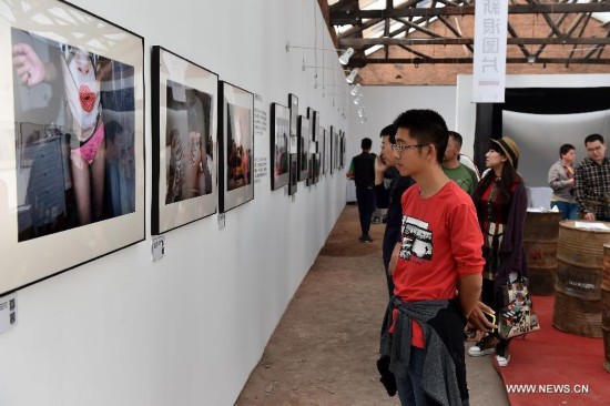 The exhibition runs here from Sept. 19 to 25, showing some 20,000 photos by over 2,000 photographers around the globe.