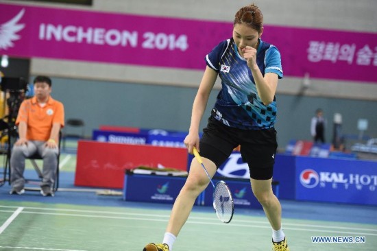 South Korea's Sung Jihyun celebrates during the final of women's team of badminton at the 17th Asian Games in Incheon, South Korea, Sept. 22, 2014. China won 3-0 and claimed the title.