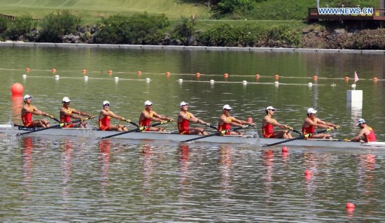 Athletes of China compete during the men's eight final of rowing at the 17th Asian Games in Chungju, South Korea, Sept. 25, 2014. China won the gold medal.