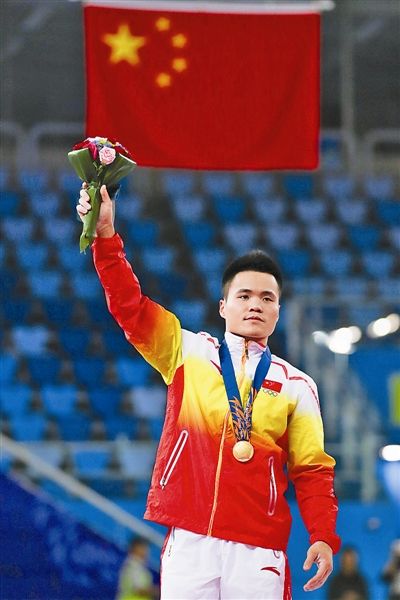 广西健儿揽两金 夺魁项目:男子体操吊环女子水