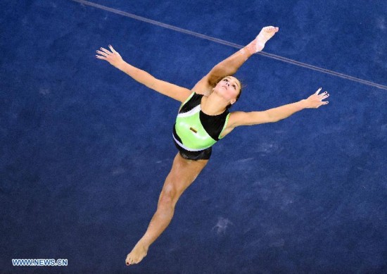 Lithuania's gymnast Vaida Zitineviciute performs in the floor exercise during the women's qualifying round of the 45th Gymnastics World Championships in Nanning, capital of south China's Guangxi Zhuang Autonomous Region, Oct. 5, 2014.