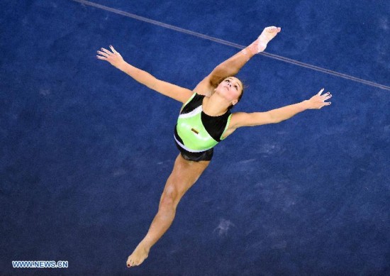 Lithuania's gymnast Vaida Zitineviciute performs in the floor exercise during the women's qualifying round of the 45th Gymnastics World Championships in Nanning, capital of south China's Guangxi Zhuang Autonomous Region, Oct. 5, 2014.