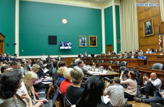 Photo taken on Oct. 16, 2014 shows a hearing on Examining the U.S. Public Health Response to the Ebola Outbreak before the Oversight and Investigations Subcommittee at Capitol Hill in Washington D.C., capital of the United States, Oct. 16, 2014. A hospital in Texas where an Ebola patient died and two nurses were infected apologized Thursday for mishandling the deadly disease, as the National Institutes of Health (NIH) prepared to treat the first nurse who contracted the virus while caring for the deceased.