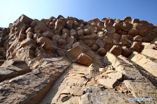 Photo taken on Oct. 19, 2014 shows the basalt columns in Zhangbei County, north China's Hebei province. A large amount of basalt columns was discovered here recently, which is considered to be formed in miocene times. (Xinhua/Yang Shiyao)