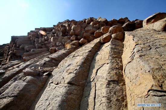 Photo taken on Oct. 19, 2014 shows the basalt columns in Zhangbei County, north China's Hebei province. A large amount of basalt columns was discovered here recently, which is considered to be formed in miocene times. (Xinhua/Yang Shiyao)