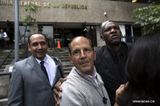 Priest and activist Alejandro Solalinde(C) arrives at the Deputy Attorney Specialized in Investigation of Organized Crimed to declare the case of the 43 missing students of the Normal Rural School 'Raul Isidro Burgos' of Ayotzinapa, in Mexico City, capital of Mexico, on Oct. 20, 2014. 