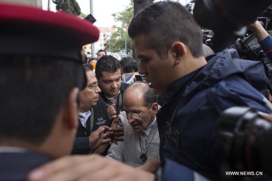 Priest and activist Alejandro Solalinde(C) arrives at the Deputy Attorney Specialized in Investigation of Organized Crimed to declare the case of the 43 missing students of the Normal Rural School 'Raul Isidro Burgos' of Ayotzinapa, in Mexico City, capital of Mexico, on Oct. 20, 2014. 