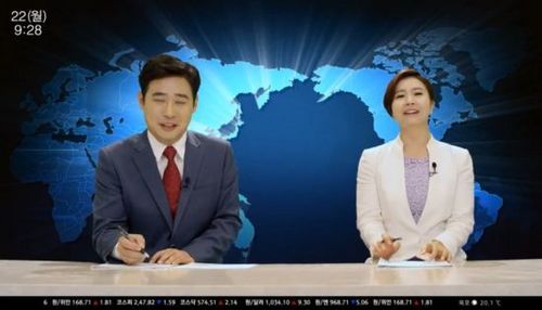 韩国新闻直播事故:女主播连带男主播笑岔气(图)