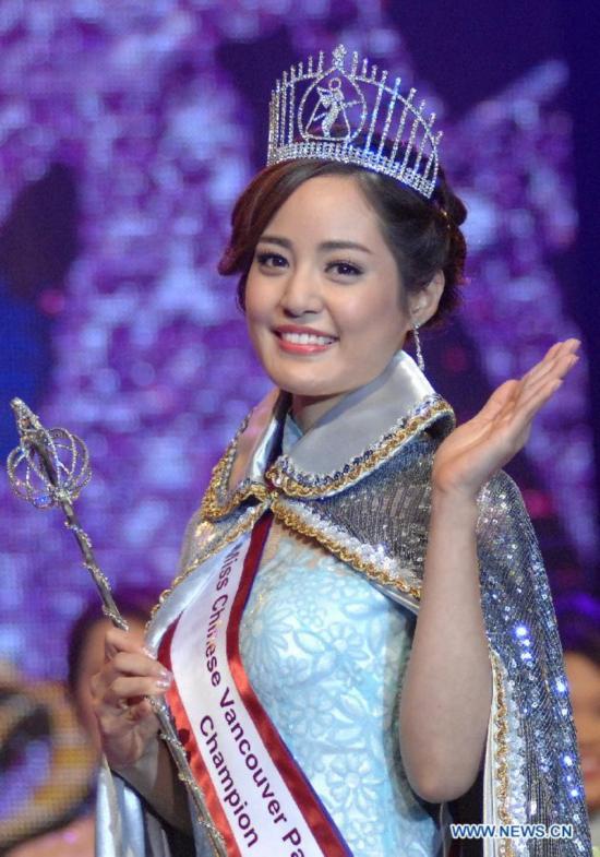 Erica Zhuhai Chen waves after winning Miss Chinese Vancouver 2014 in Vancouver, Canada, Dec.10, 2014. Erica Zhuhai Chen will be competing in the upcoming Miss Chinese International Pageant in Hong Kong in January 2015.