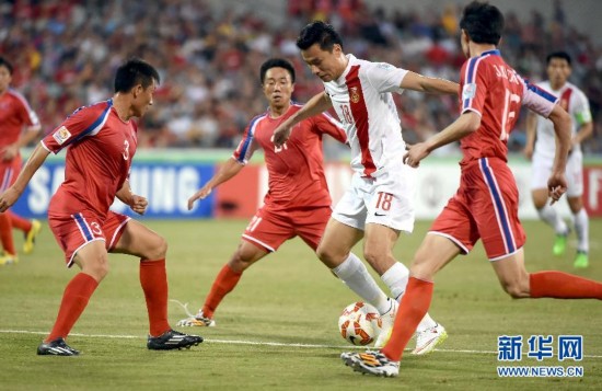 精彩瞬间:亚洲杯中国队2-1战胜朝鲜队(组图)