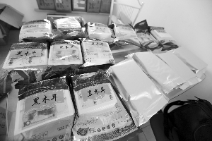 情侣用打印机打出600万假币 通过物流发往全国