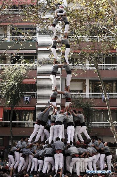 Chinese girl in local Spanish human tower team